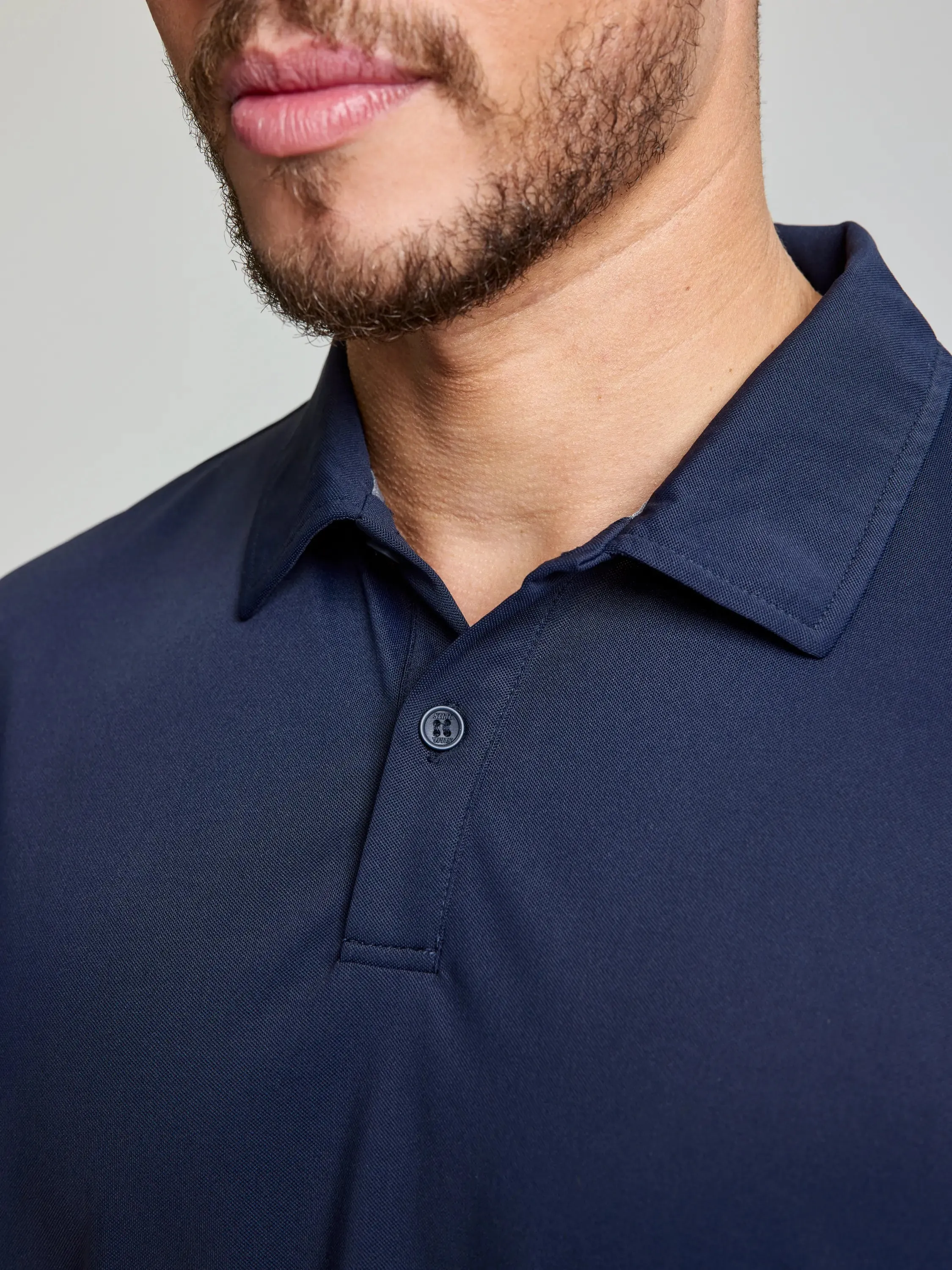 TECH PIQUE POLO SHORT SLEEVE